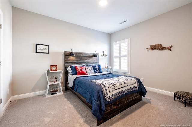 bedroom featuring carpet