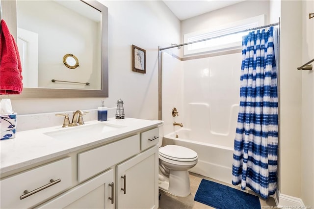 full bathroom with tile patterned flooring, vanity, shower / tub combo with curtain, and toilet