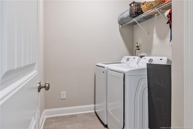 washroom featuring separate washer and dryer