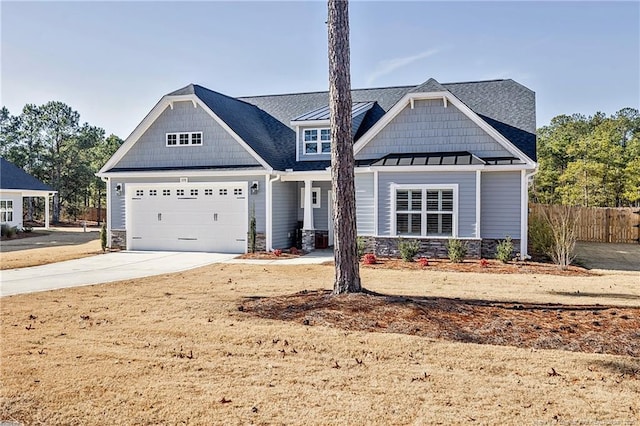 craftsman house featuring a garage