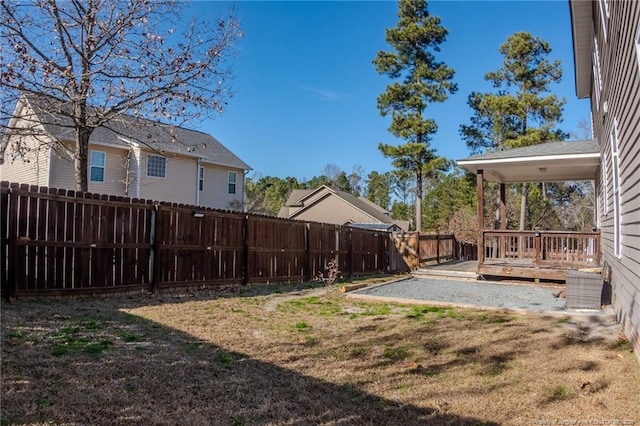 view of yard featuring a deck