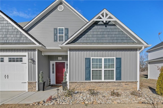 craftsman-style home with a garage