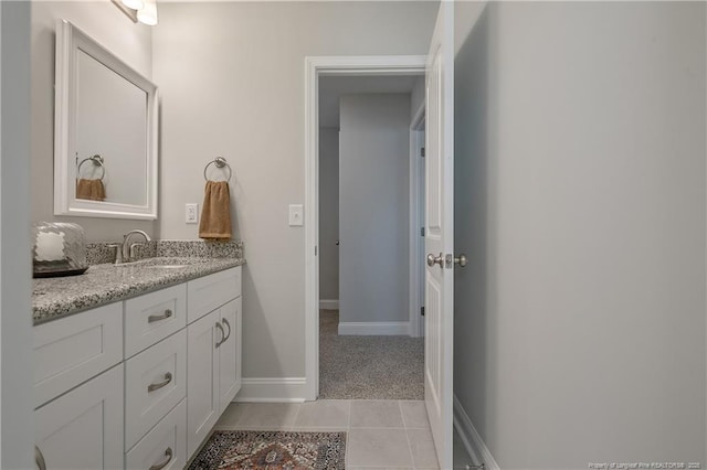 bathroom featuring tile patterned floors and vanity