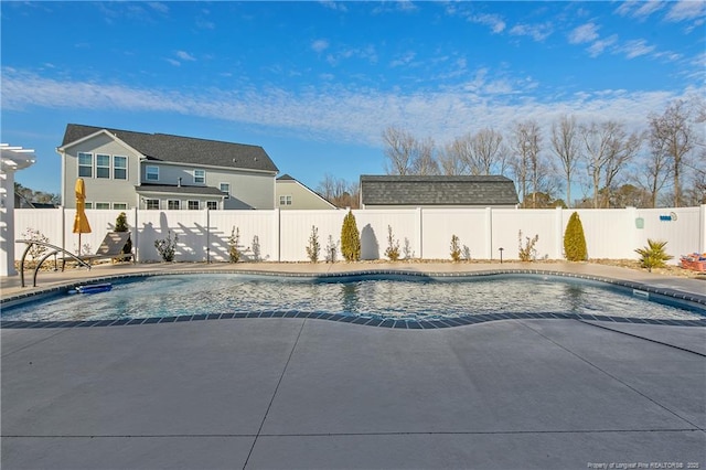 view of swimming pool featuring a patio area