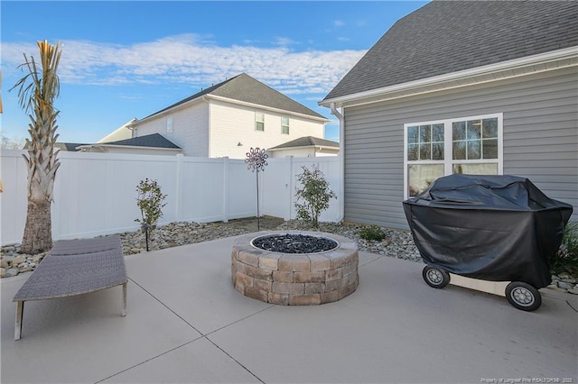 view of patio / terrace featuring a fire pit