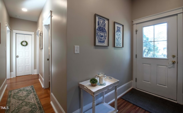 doorway to outside with hardwood / wood-style flooring