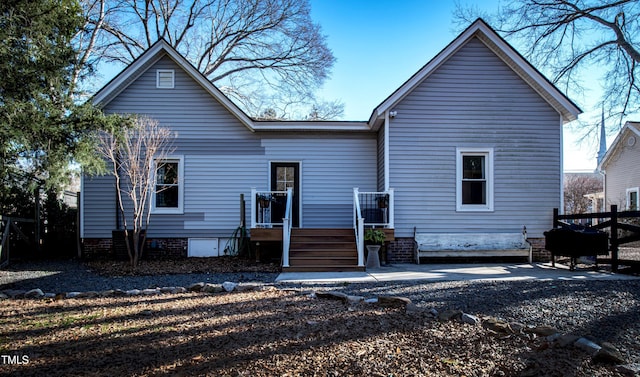 back of property with a patio area