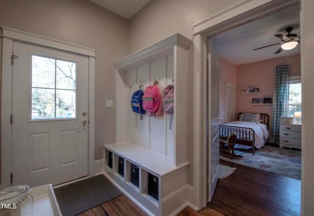 mudroom with ceiling fan and dark hardwood / wood-style floors