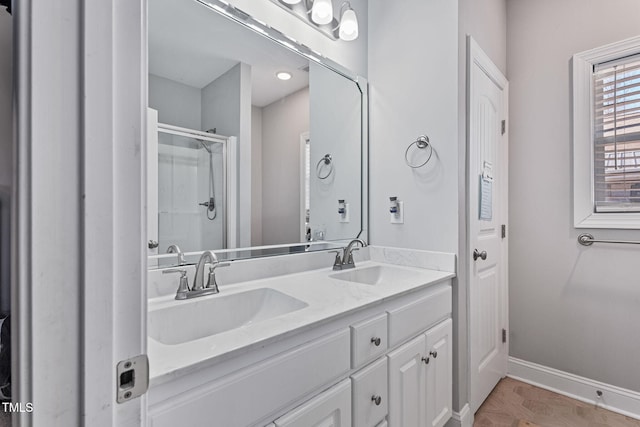 bathroom featuring vanity and walk in shower