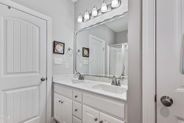 bathroom with vanity and walk in shower