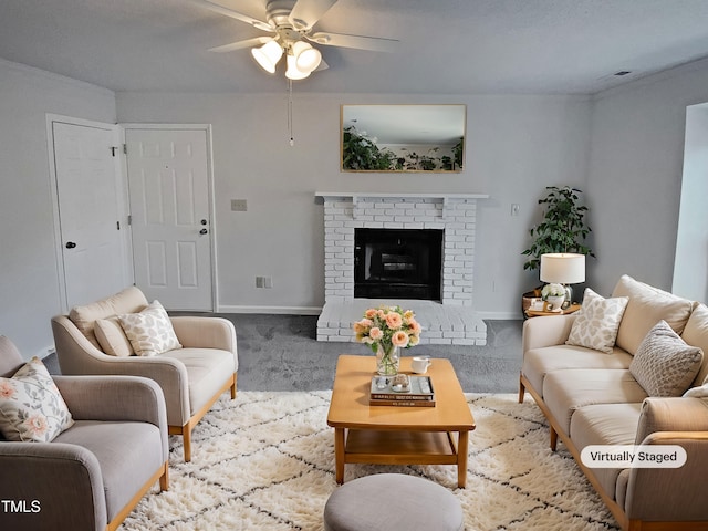 living room featuring ceiling fan, light carpet, and a fireplace