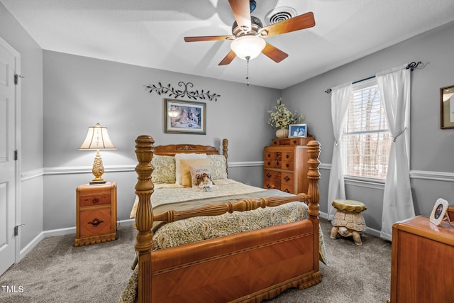 bedroom with ceiling fan and carpet flooring