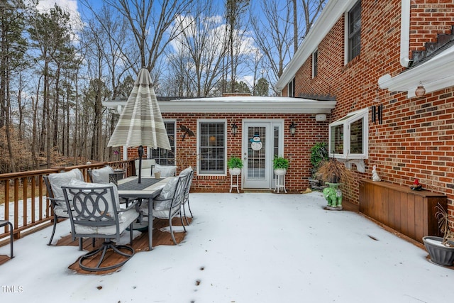 view of snow covered deck