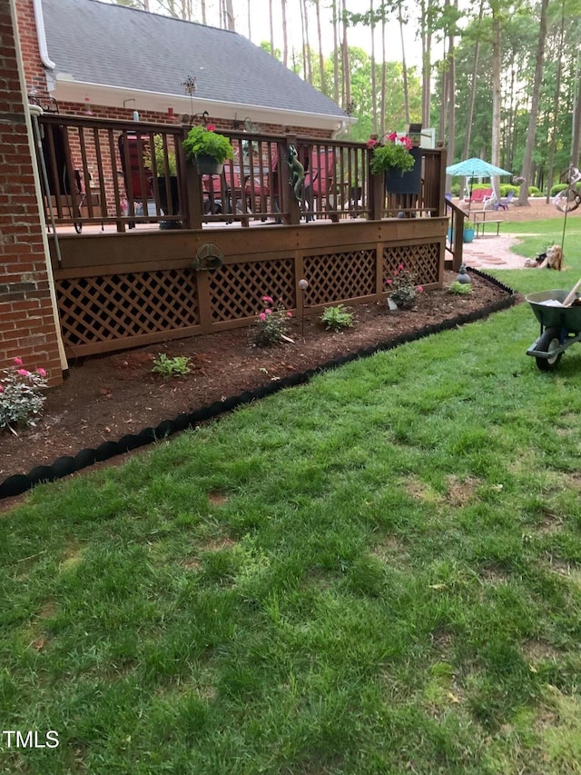 view of yard featuring a deck