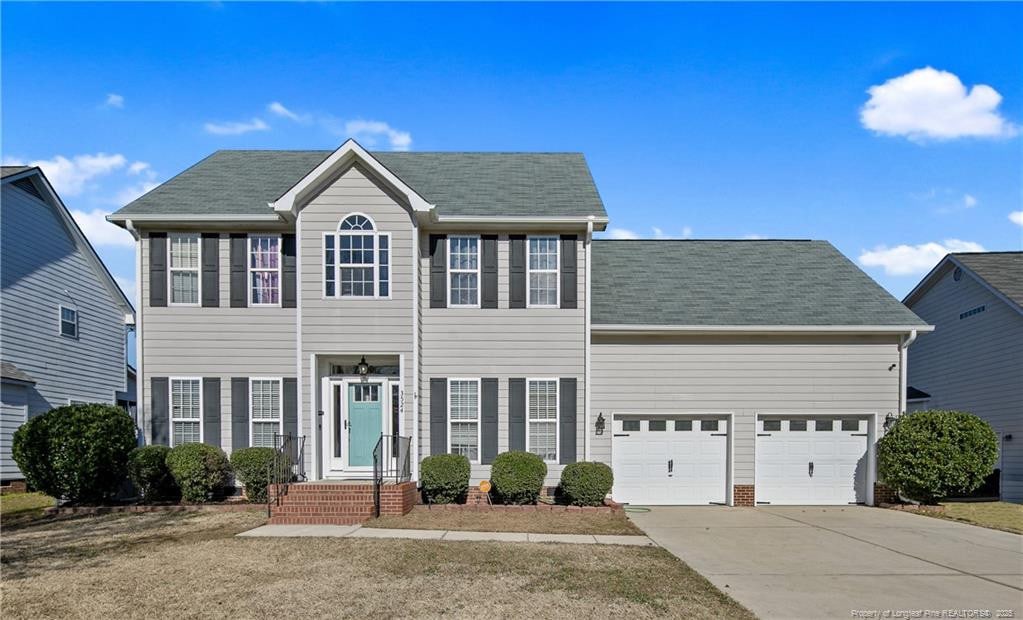 colonial-style house with a garage