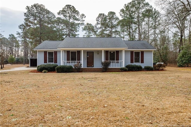 ranch-style home featuring a front yard and a porch