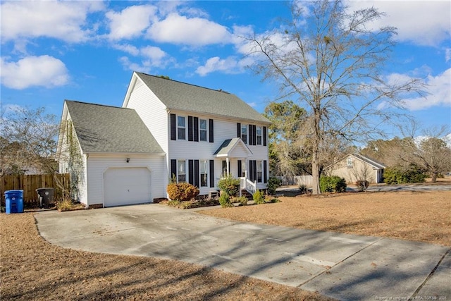 colonial home with a garage