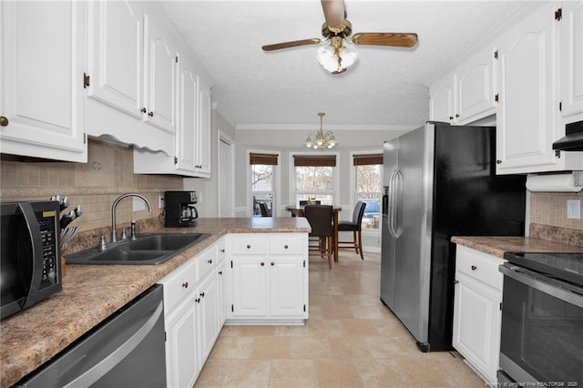 kitchen featuring ceiling fan with notable chandelier, white cabinets, stainless steel appliances, sink, and backsplash