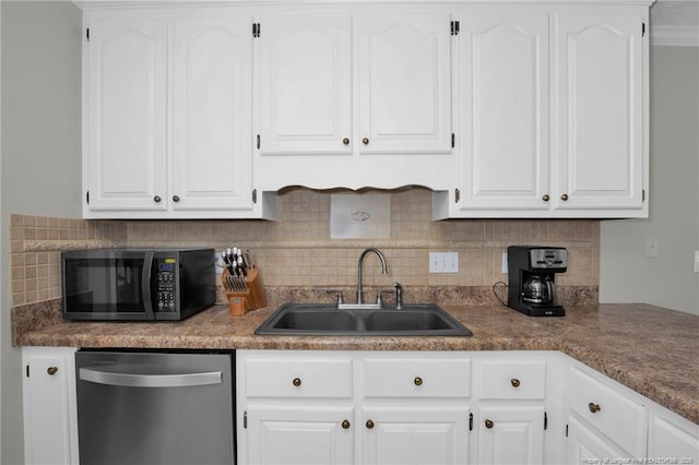 kitchen featuring white cabinets and dishwasher