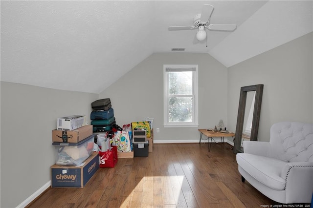 rec room featuring ceiling fan, vaulted ceiling, and hardwood / wood-style flooring