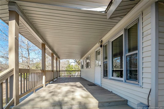 wooden deck featuring a porch