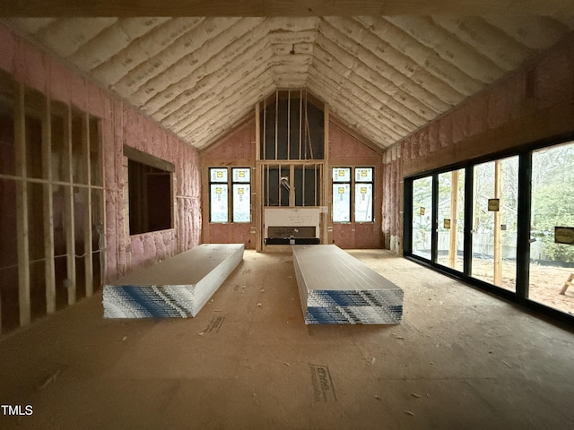 misc room with high vaulted ceiling