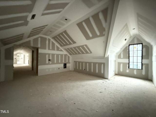 bonus room featuring vaulted ceiling