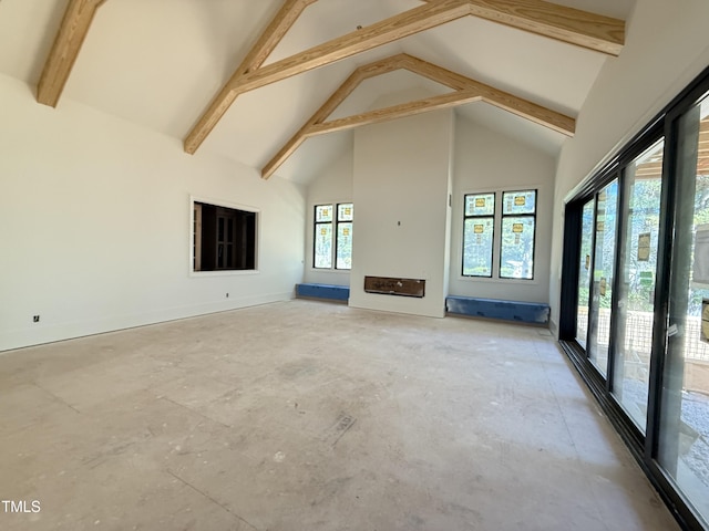 unfurnished living room featuring high vaulted ceiling, baseboards, and beamed ceiling
