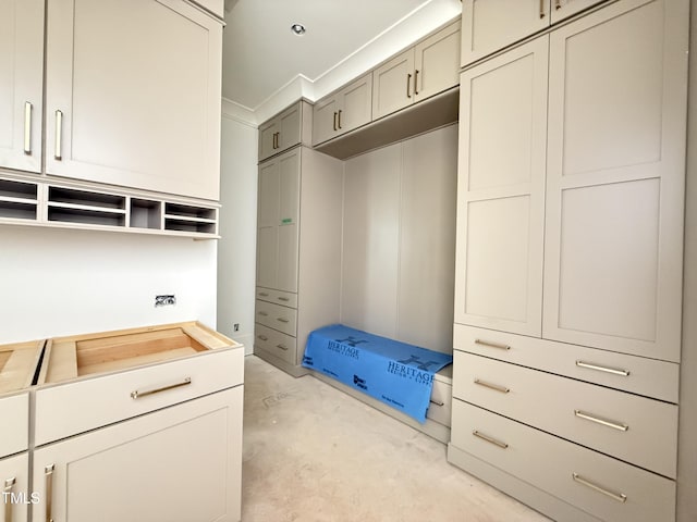 mudroom featuring unfinished concrete floors