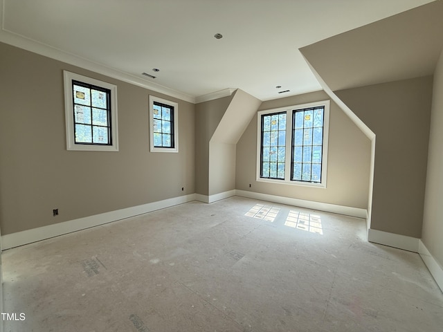 bonus room featuring baseboards and visible vents