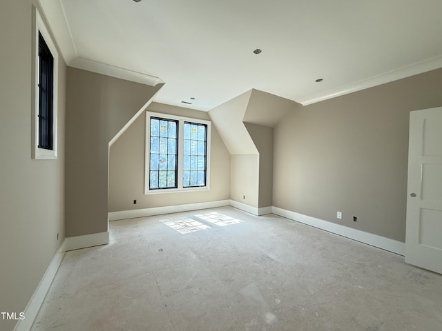 bonus room featuring baseboards