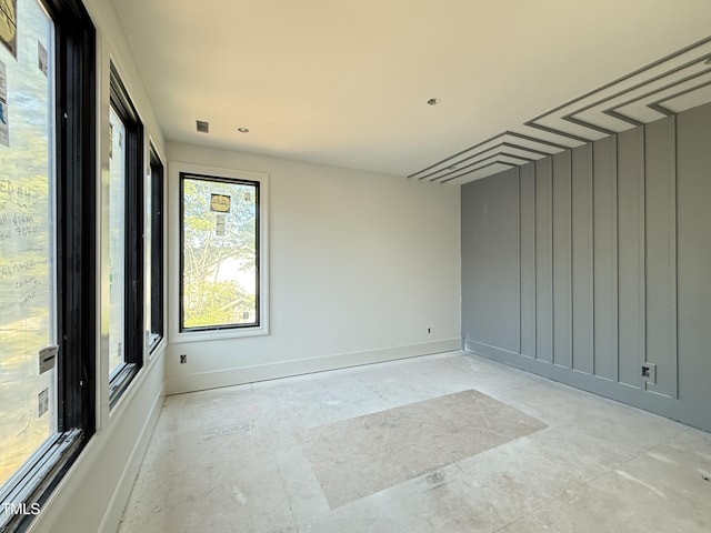 empty room with baseboards