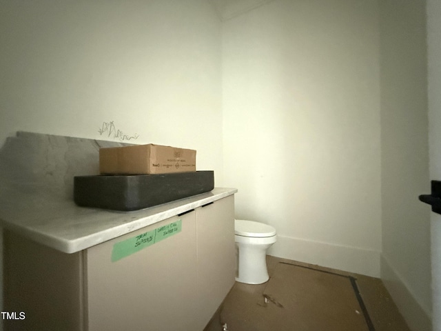 7013 Buckhead Dr, Raleigh, NC 27615 - bathroom with toilet and baseboards
