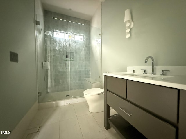7013 Buckhead Dr, Raleigh, NC 27615 - bathroom featuring vanity, toilet, a shower stall, and tile patterned flooring