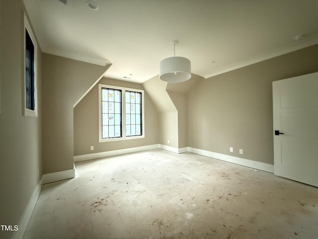 7013 Buckhead Dr, Raleigh, NC 27615 - additional living space with baseboards, vaulted ceiling, and concrete flooring