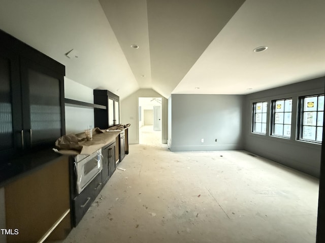 7013 Buckhead Dr, Raleigh, NC 27615 - unfurnished living room featuring vaulted ceiling and recessed lighting