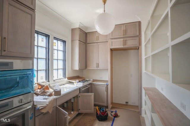 7013 Buckhead Dr, Raleigh, NC 27615 - kitchen featuring appliances with stainless steel finishes, light countertops, and open shelves