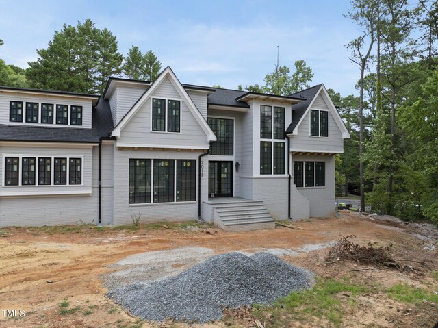 7013 Buckhead Dr, Raleigh, NC 27615 - view of front of property featuring brick siding and a shingled roof