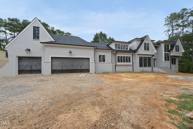 7013 Buckhead Dr, Raleigh, NC 27615 - view of front of property featuring brick siding, driveway, and an attached garage