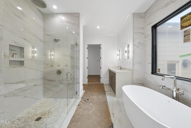 7013 Buckhead Dr, Raleigh, NC 27615 - full bathroom with a marble finish shower, a soaking tub, crown molding, vanity, and recessed lighting