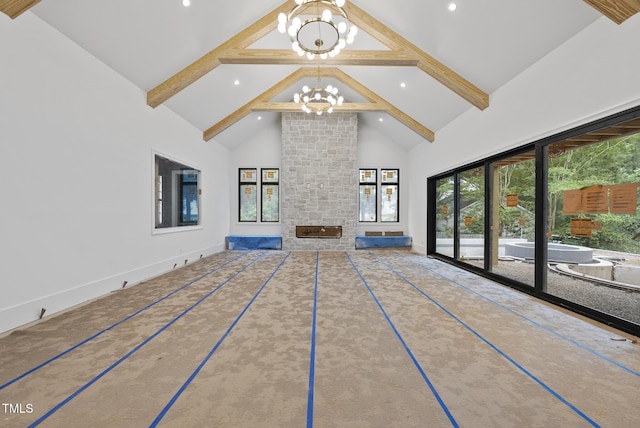 7013 Buckhead Dr, Raleigh, NC 27615 - unfurnished living room featuring a chandelier, high vaulted ceiling, beamed ceiling, recessed lighting, and a stone fireplace