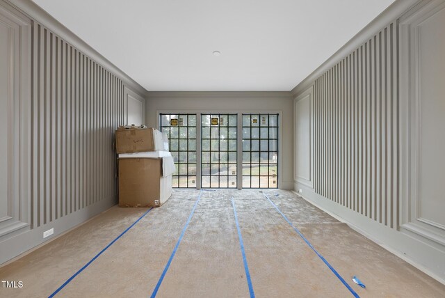 7013 Buckhead Dr, Raleigh, NC 27615 - unfurnished living room with a decorative wall and ornamental molding