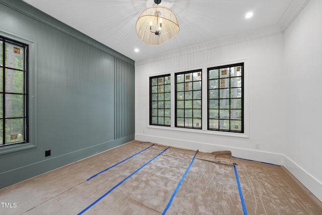 7013 Buckhead Dr, Raleigh, NC 27615 - spare room with healthy amount of natural light and ornamental molding
