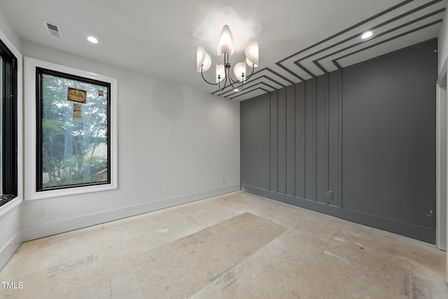 7013 Buckhead Dr, Raleigh, NC 27615 - spare room with a chandelier and recessed lighting