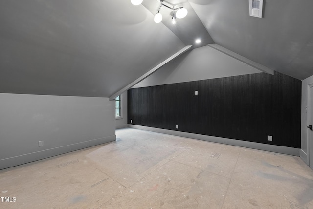 7013 Buckhead Dr, Raleigh, NC 27615 - additional living space featuring vaulted ceiling and baseboards
