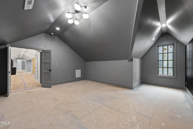 7013 Buckhead Dr, Raleigh, NC 27615 - additional living space with vaulted ceiling and a chandelier