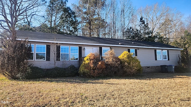 view of property exterior with a yard