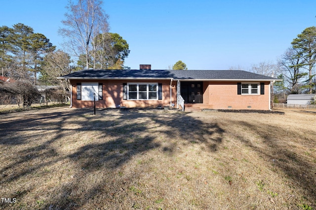 ranch-style house featuring a front lawn