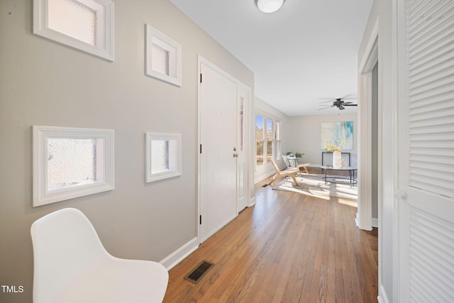 hall featuring hardwood / wood-style floors