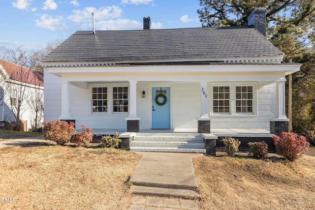 view of front of home featuring covered porch